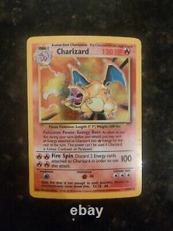 1999 Pokemon Charizard 4/102 Base Set Unlimited Holo Rare NM Very Good