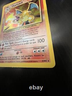 Charizard 4/102 Base Set Unlimited Holo Pokémon Card VERY GOOD CONDITION