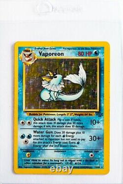 Holographic Vaporeon 12/64 Very Rare Jungle Set Pokemon Card 1999