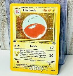 1ère Édition Electrode Holo Rare 2/64 Pokemon Card Jungle Set Wotc Très Bon