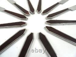 Très rare ensemble de 12 couteaux Art Déco avant-gardistes en bakélite et acier inoxydable